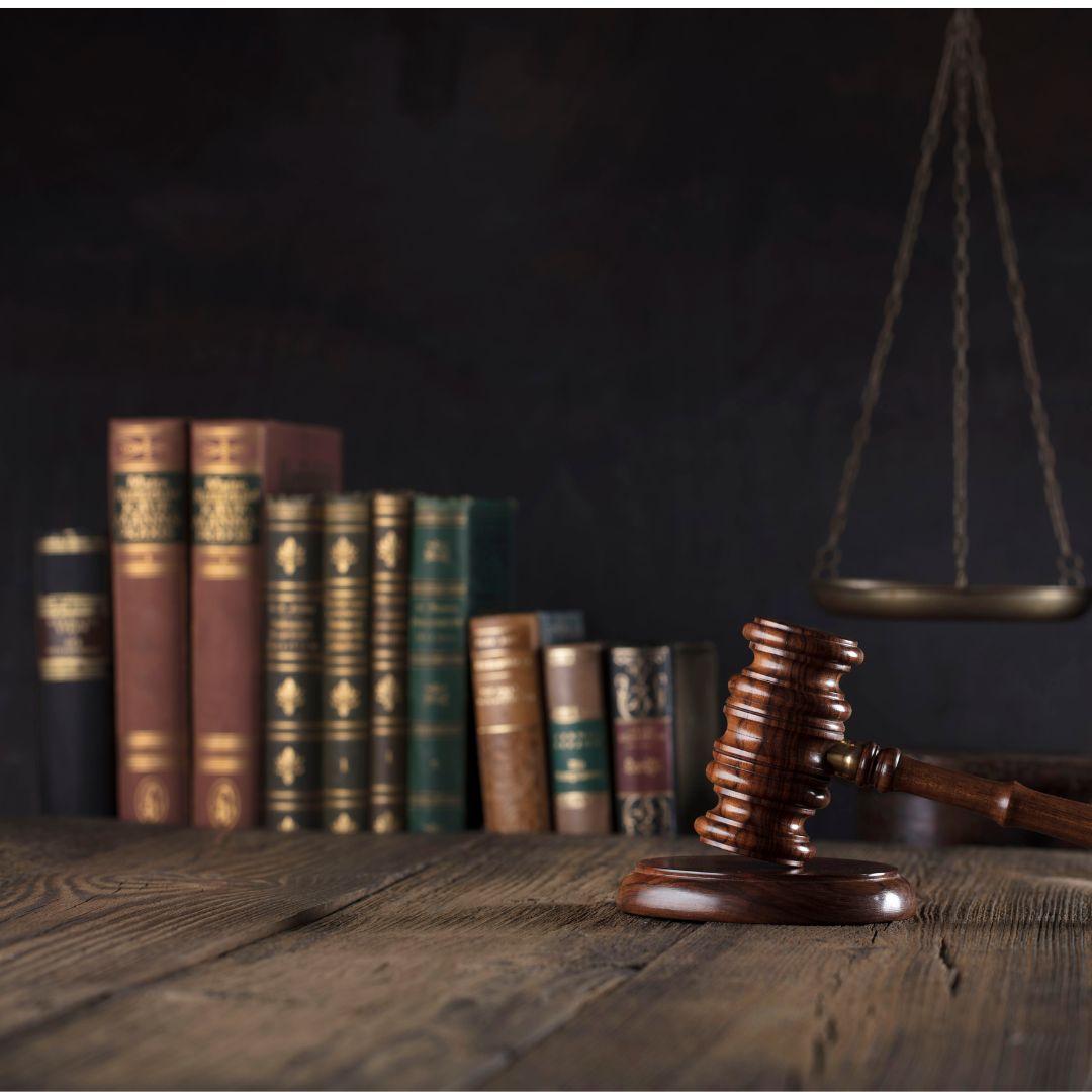 New York legal reference volumes on a desk, illustrating how legal deadlines are found in the law